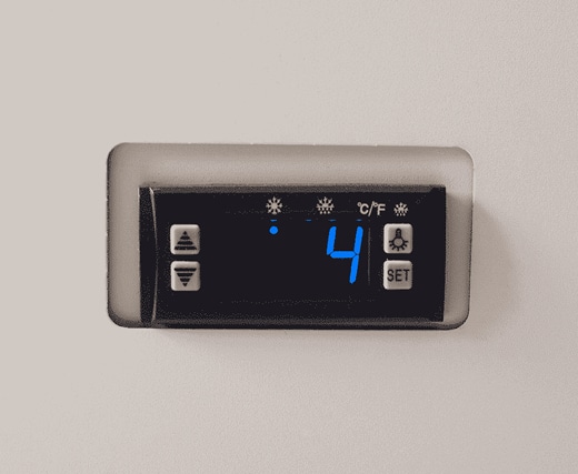 How do you monitor industrial refrigerator temperature?