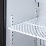 Image of the shelves of a bromic BB0120GD-NR-1 under bench display bar fridge.