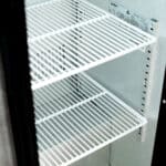 Image of the internal shelves of a bromic BB0330GDS-NR-1 under bench display bar fridge.