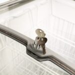 Image of the lock and key feature of the bromic CF0200ATCG-NR chest freezer.