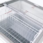Image of the inside of a 191L small white display chest freezer with baskets.