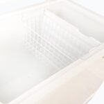 Image of the inside of a 296L small white chest freezer with stainless steel top, showing the baskets.