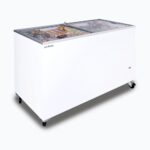 Image of a 401L medium white display chest freezer with a flat glass top, left angled view with frozen goods inside.