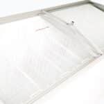 Image of the inside of a 427L medium white display chest freezer showcasing the baskets.