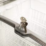 Image of the lock and key feature of the bromic CF0500ATCG-NR chest freezer.