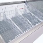 Image of the inside of 491L medium white display chest freezer, lip open.