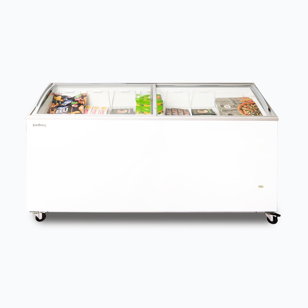 Image of a 555L large white display chest freezer with a curved glass top, front view with frozen goods inside.