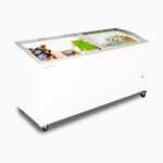 Image of a 555L large white display chest freezer with a curved glass top opened with frozen goods inside.