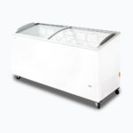 Image of a 555L large white display chest freezer with a curved glass top, right angled view.