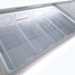 Image of the inside of 670L large white display chest freezer, lip open.