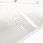 Image of the inside of 675L large white display chest freezer showcasing baskets, lid open.