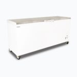 Image of a 675L large white chest freezer with a stainless steel top, left angled view.