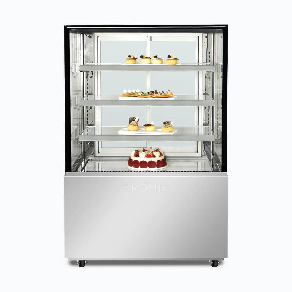 Image of a 900mm wide stainless steel cold food display, front view with desserts inside.