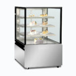 Image of a 900mm wide stainless steel cold food display, left angled view with desserts inside.
