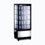 Image of a 98L black countertop fridge with a curved glass, left angled view with canned drinks inside.