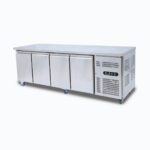 Image of 553L stainless steel under bench storage freezer with four hinged doors, right angled view.