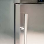 Image of the handle of a bromic UBC0140SD-NR under bench storage fridge.