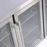 Image of a 553L stainless steel under bench display fridge with four hinged doors, top view.