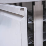 Image of the handle of a bromic UBC2230SD-NR under bench storage fridge.