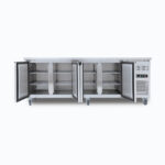 Image of a 553L stainless steel under bench storage fridge with four opened hinged doors.
