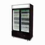 Image of a 960L black cassette upright display fridge with lightbox and two doors, right angled view with drinks inside.