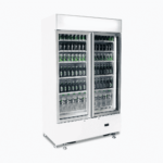 Image of a 960L white cassette upright display fridge with lightbox and two doors, left angled view with drinks inside.