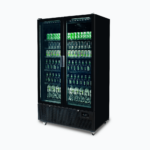Image of a 1126L black upright display fridge with two doors, right angled with drinks inside.