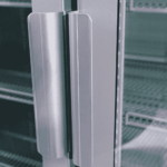 Image of the handle of a bromic GM1100LS-NR upright display fridge.