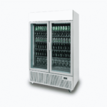 Image of a 1082L silver upright display fridge with lightbox and two doors, right angled view with drinks inside.