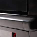 Image of the bumper rail of a bromic semi vertical display fridge.