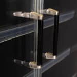 Image of the handle of a bromic semi vertical display fridge with hinged doors.